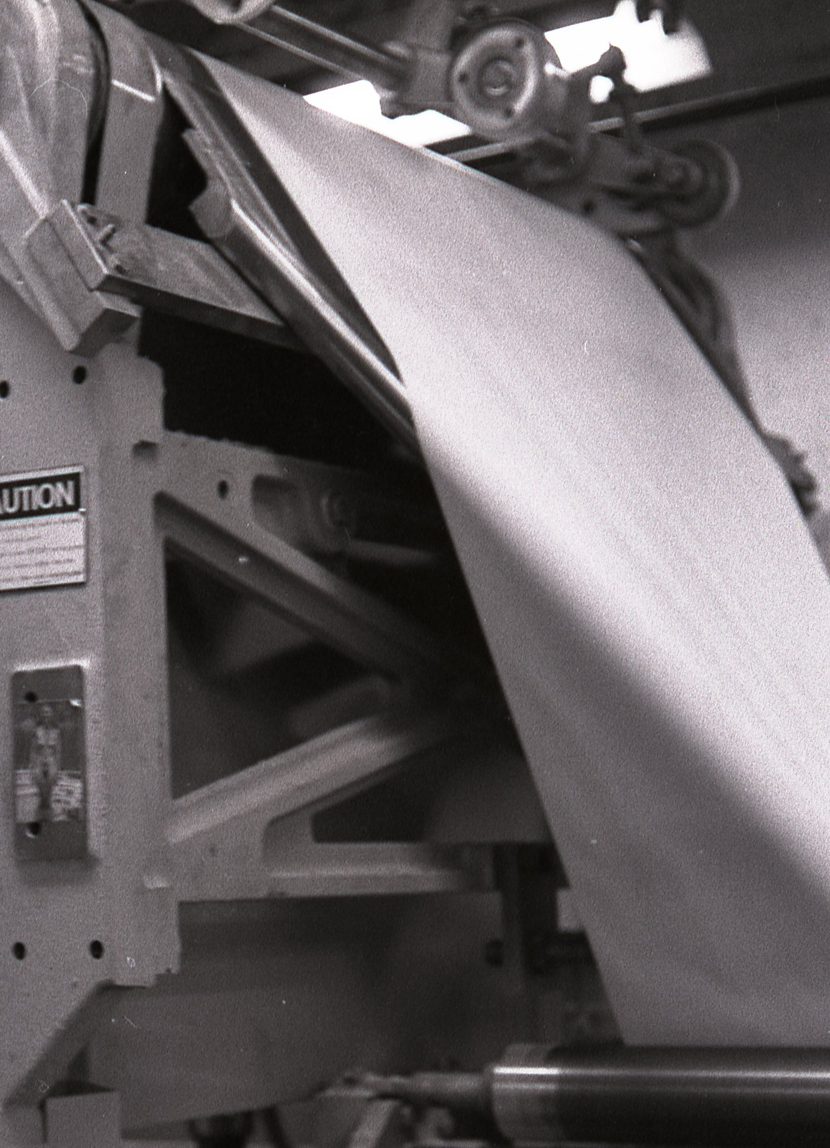 Paper starts to feed off press, Weller Publishing